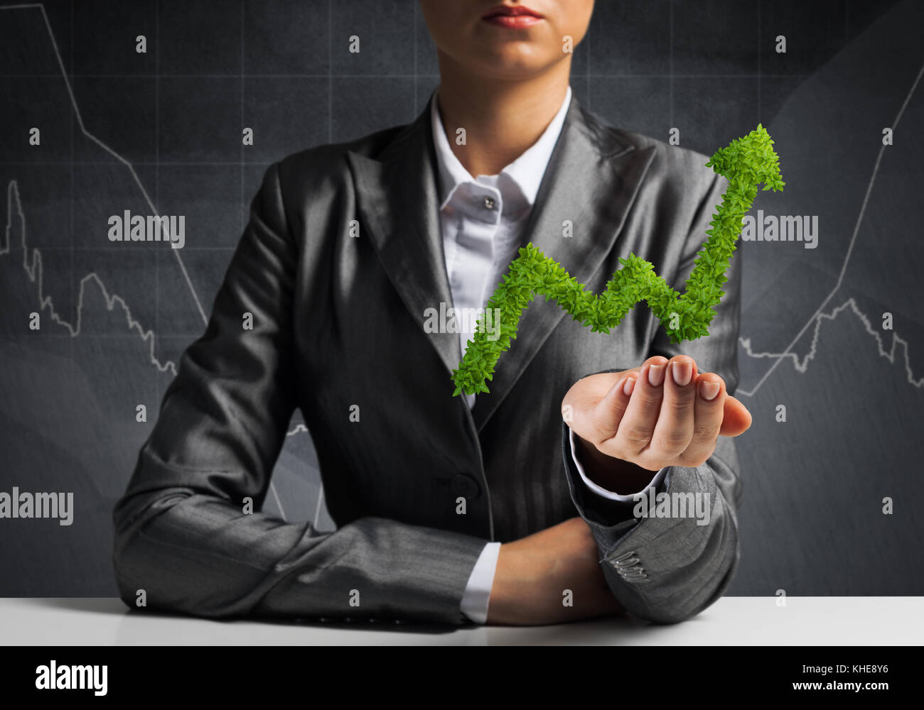 Businessman presenting growing graph Stock Photo - Alamy