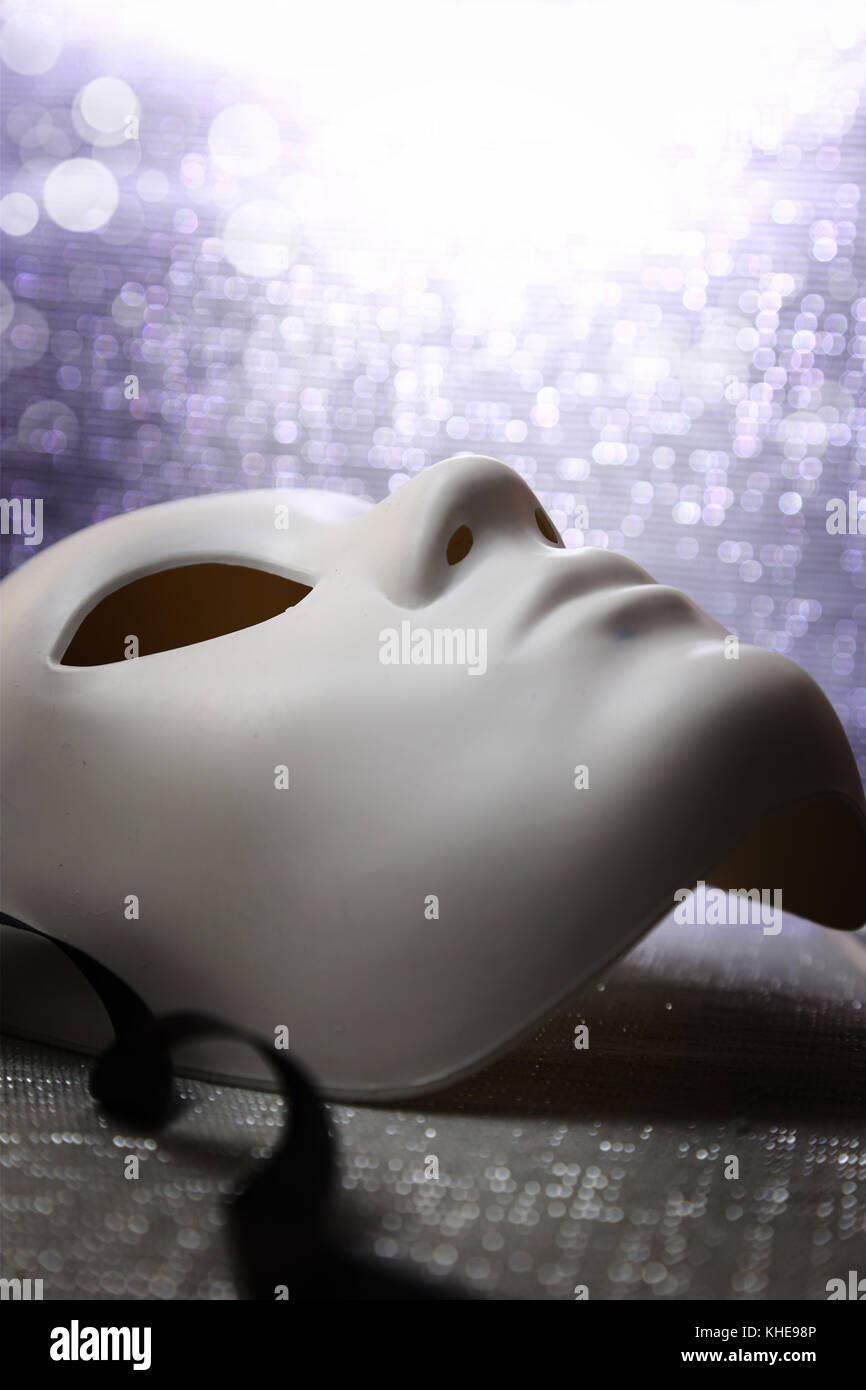 White mask with glittering background Stock Photo - Alamy