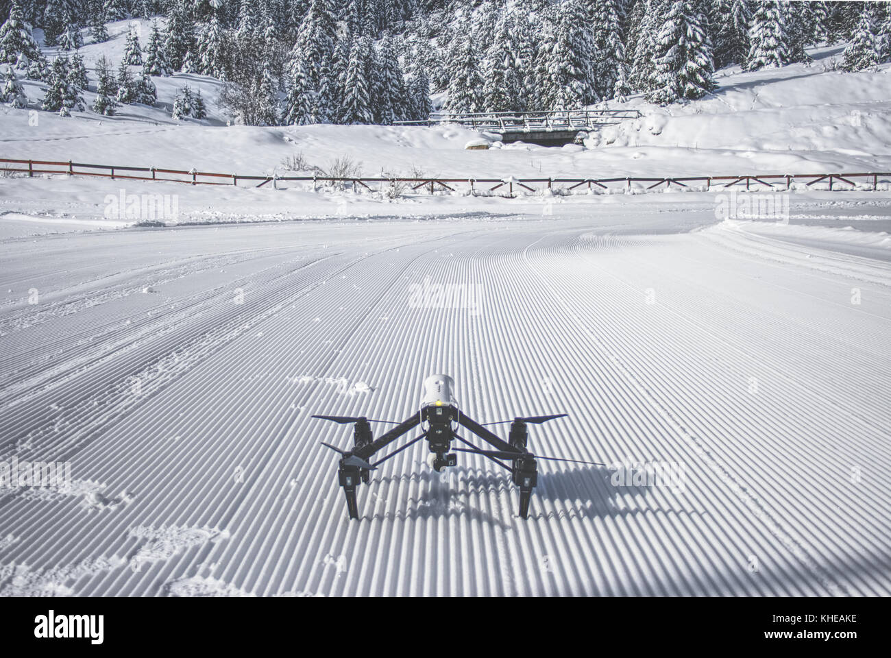 DJI Inspire 1 Drone powered on and ready to take flight in the snowy mountains of Bulgaria Stock Photo