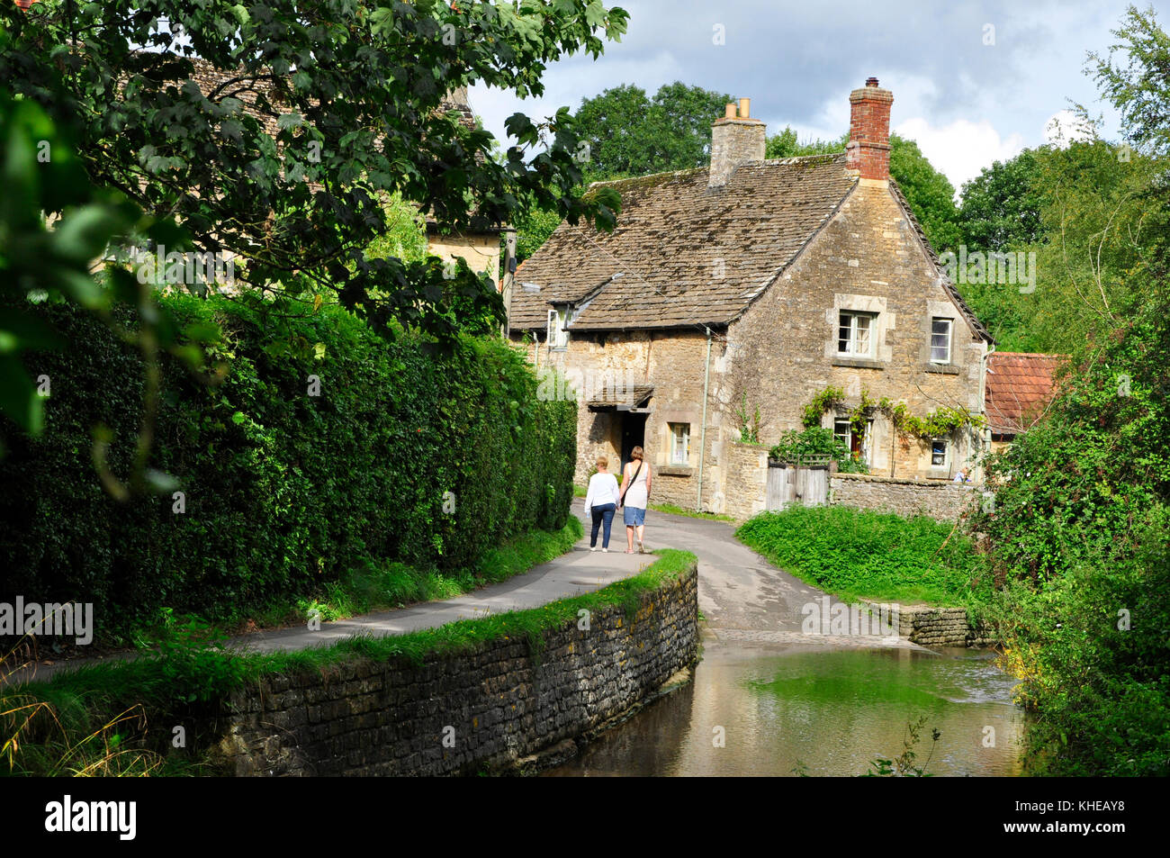 The ford in Lacock Village. A quiet tranquil scene in summer.Wiltshire UK Stock Photo