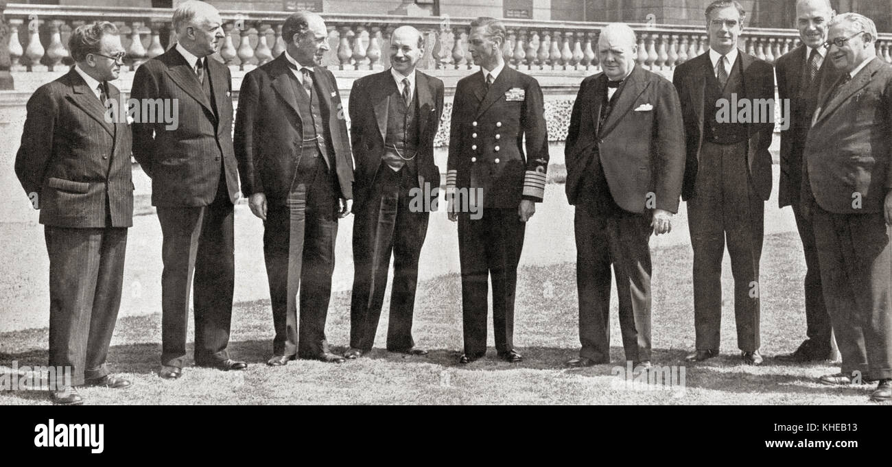 Members of the War Cabinet of the All Party Government during WWII, from left to right, Mr. Morrison (Home Office), Lord Woolton (Reconstruction), Sir John Anderson (Exchequer), Mr. Attlee (Deputy Prime Minister), King George VI, Winston Churchill (Prime Minister), Mr. Eden (Foreign Affairs), Mr. Lyttelton (Production), and Mr. Bevin (Labour). Stock Photo