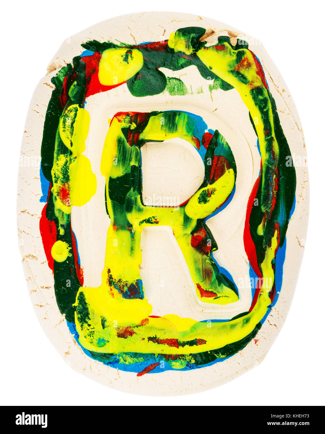 Handmade of white clay letter R painted with colorful acrylic paints ...