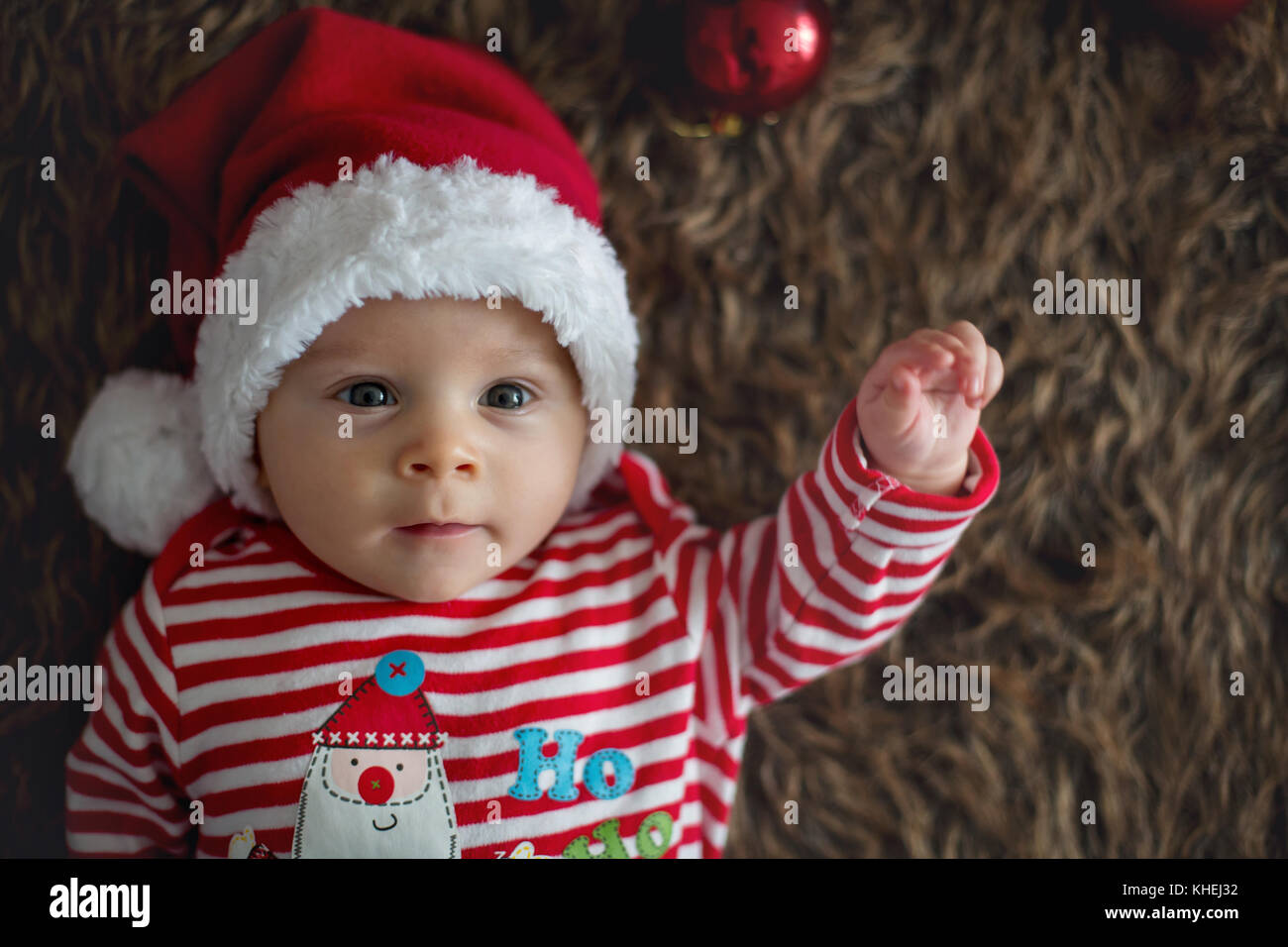 Christmas Portrait Of Cute Little Newborn Baby Boy Dressed In Stock