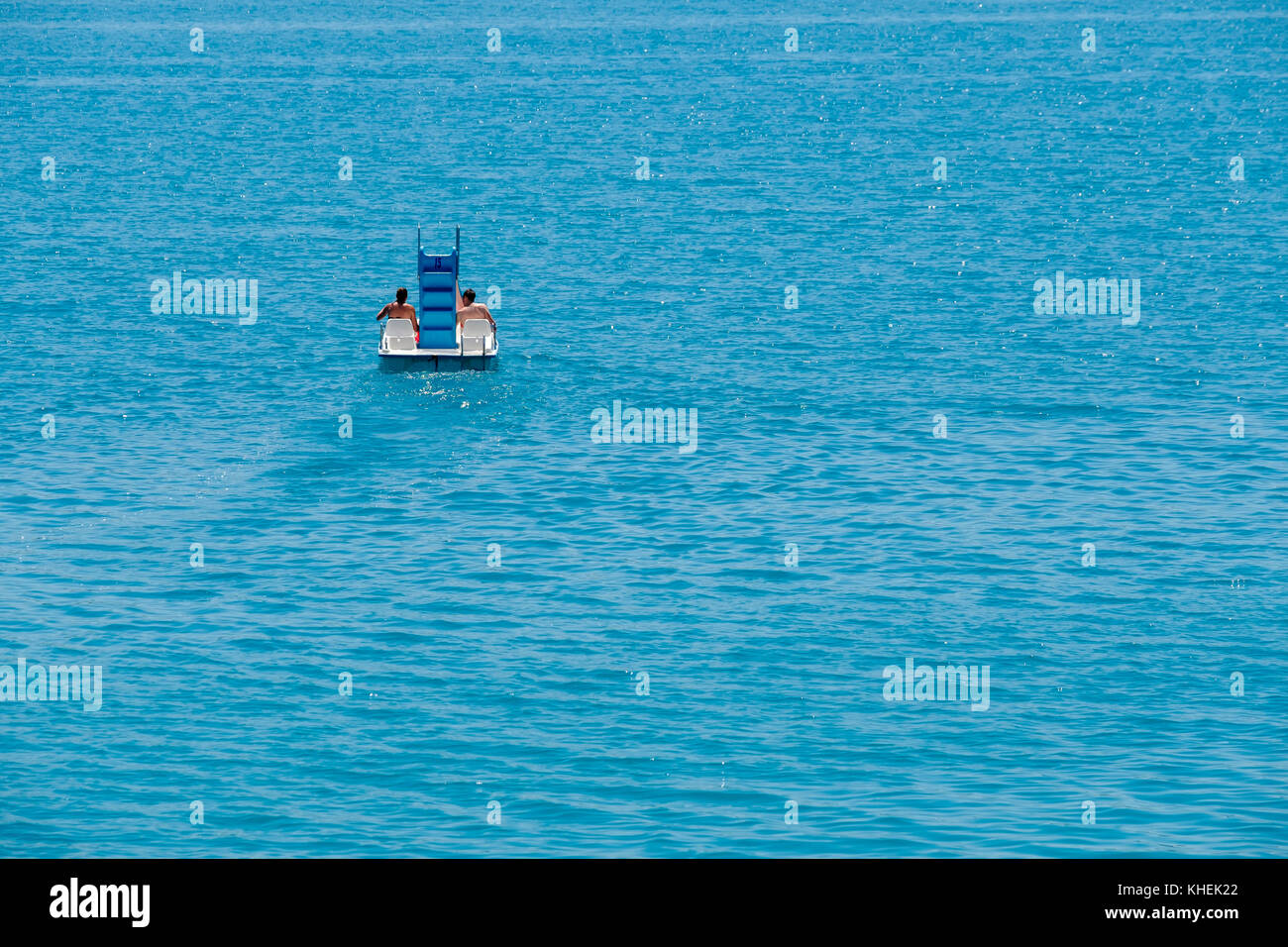 Couple riding pedal boat Stock Photo Alamy