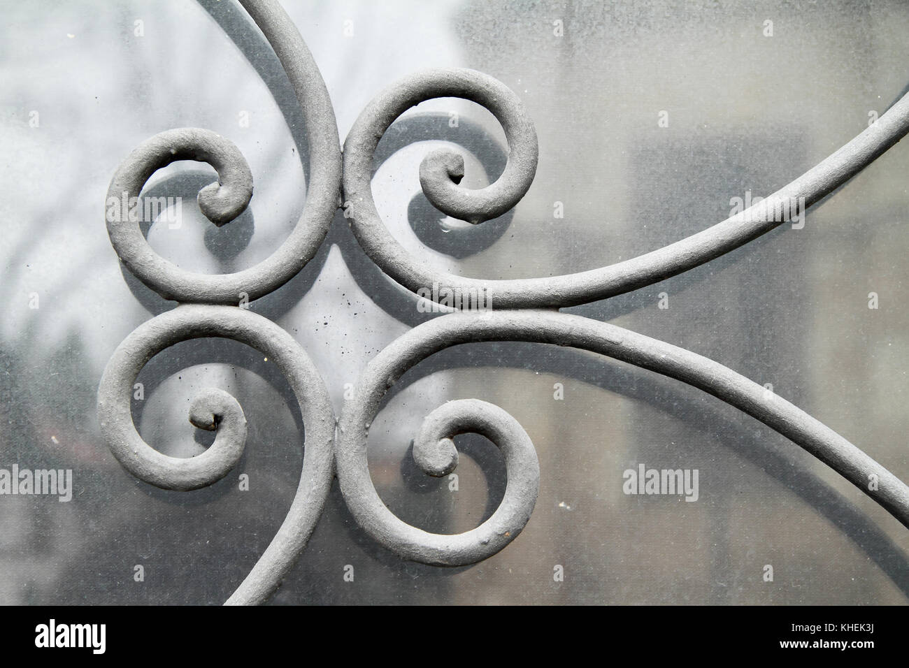 Forged iron gate over a window Stock Photo