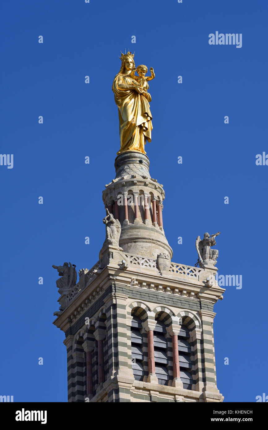 Gold plated statue of the Virgin and Child, spire of the church Notre Dame de la Garde, Marseille, department Bouches-du-Rhône Stock Photo