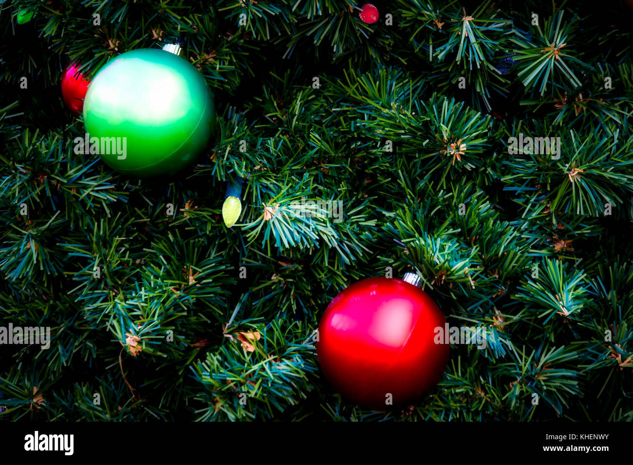 A traditional Christmas tree with colorful ornaments for the holidays. Stock Photo