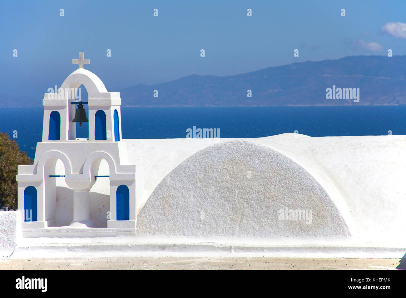 Bell tower of a orthodox church at the crater edge of the village village Oia, Santorin island, Cyclades, Aegean, Greece Stock Photo