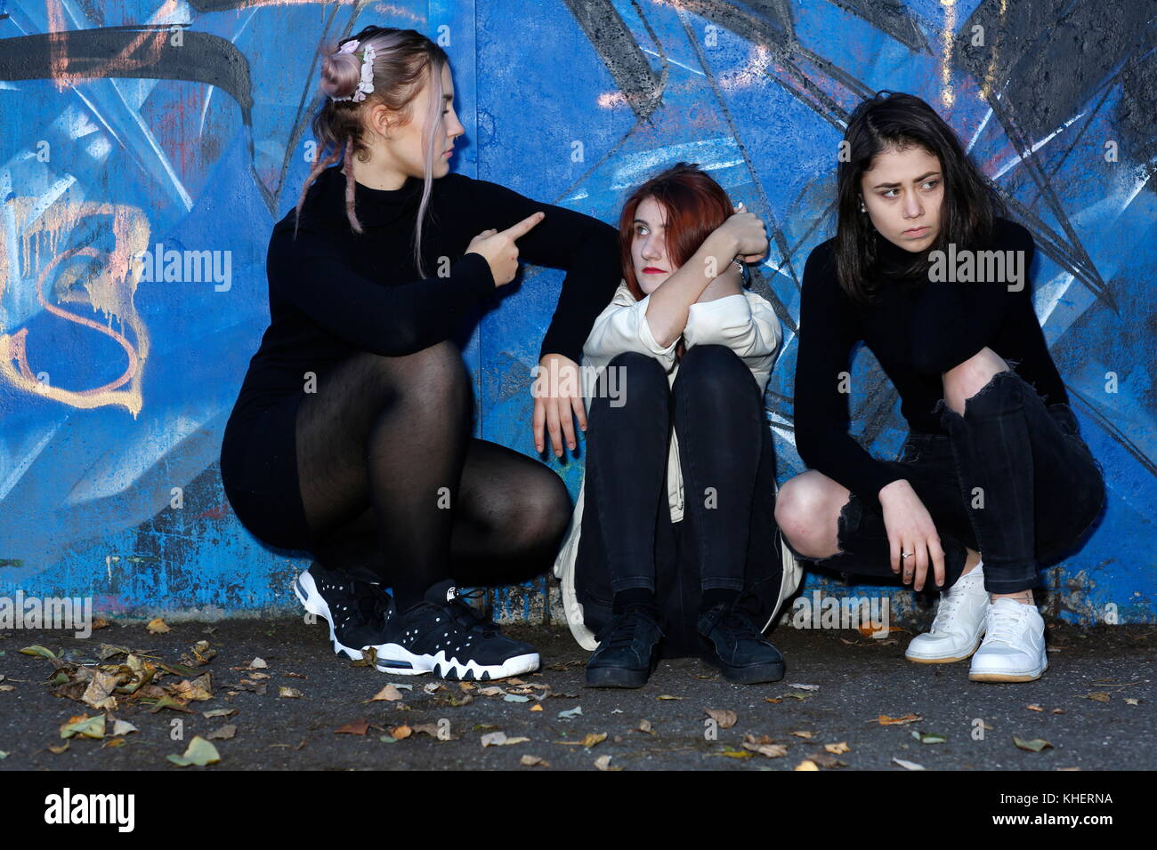three angry teenegers, rebels Stock Photo - Alamy