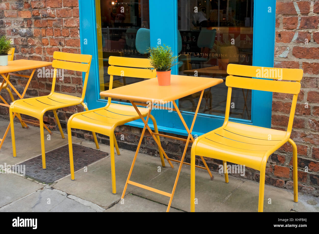Empty tables table and chair chairs outside restaurant cafe bar pub England UK United Kingdom GB Great Britain Stock Photo