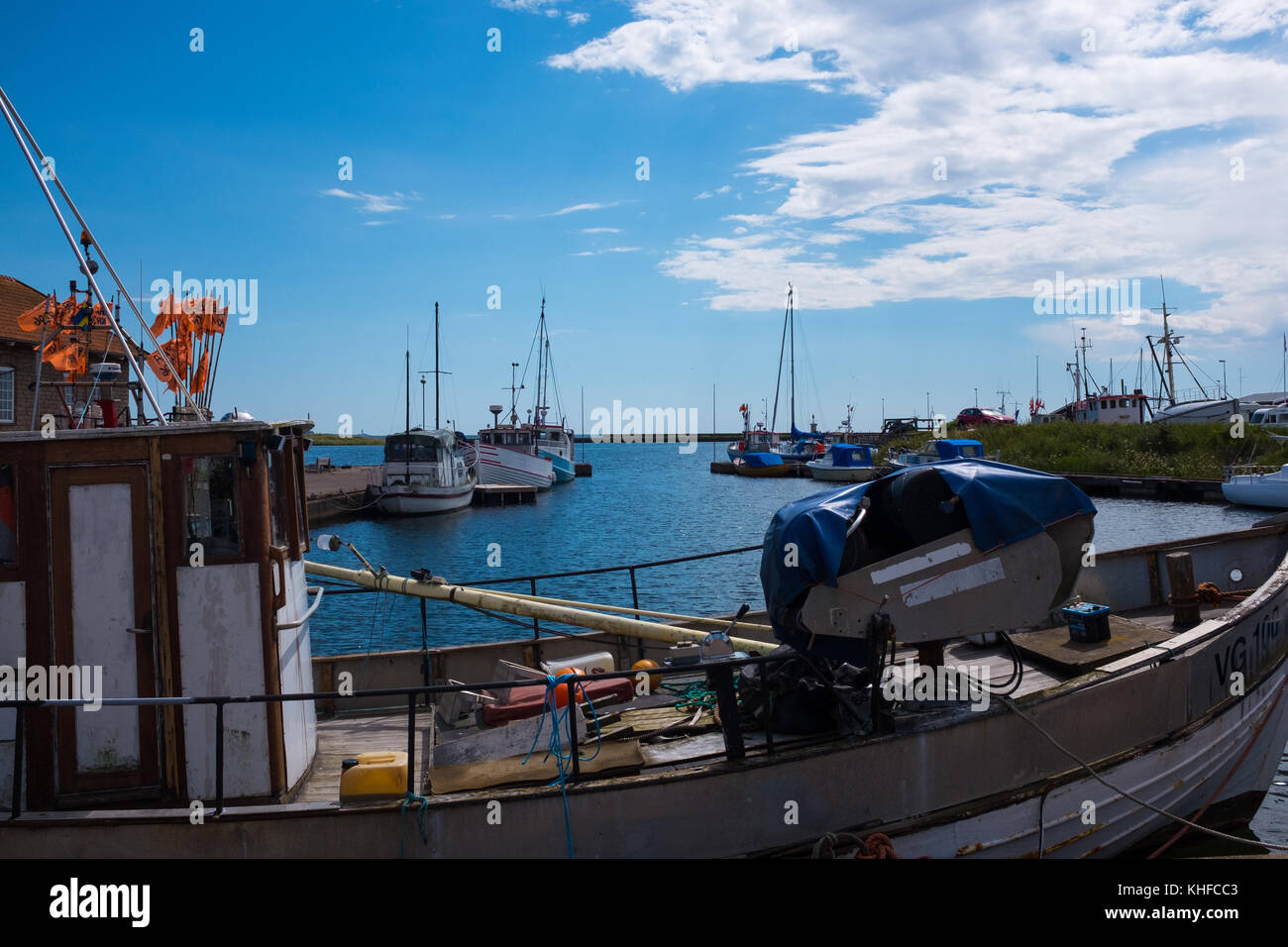 Calm smalltown fishing harbor in southern Sweden Stock Photo