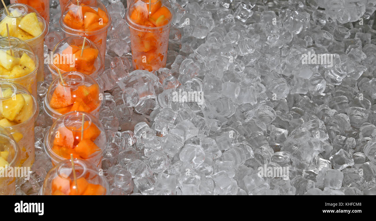 fresh fruit salad with pieces of fruit and ice cubes Stock Photo