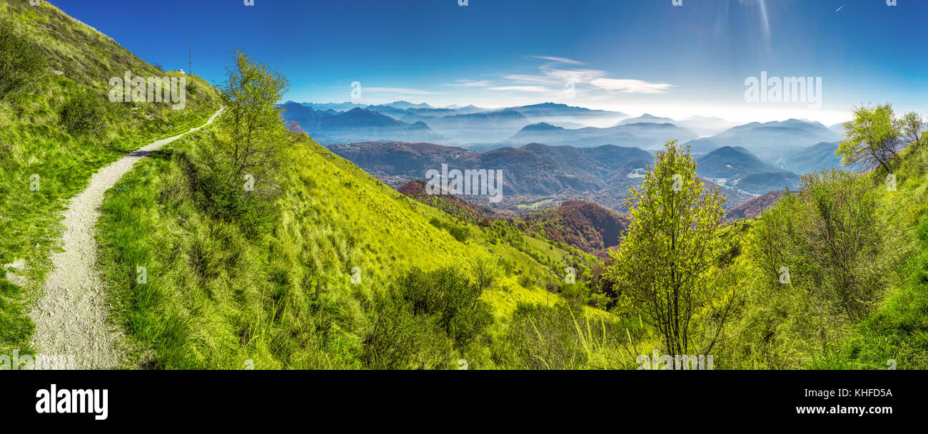 View to Lugano city, San Salvatore mountain and Lugano lake from Monte Lema, Canton Ticino, Switzerland Stock Photo
