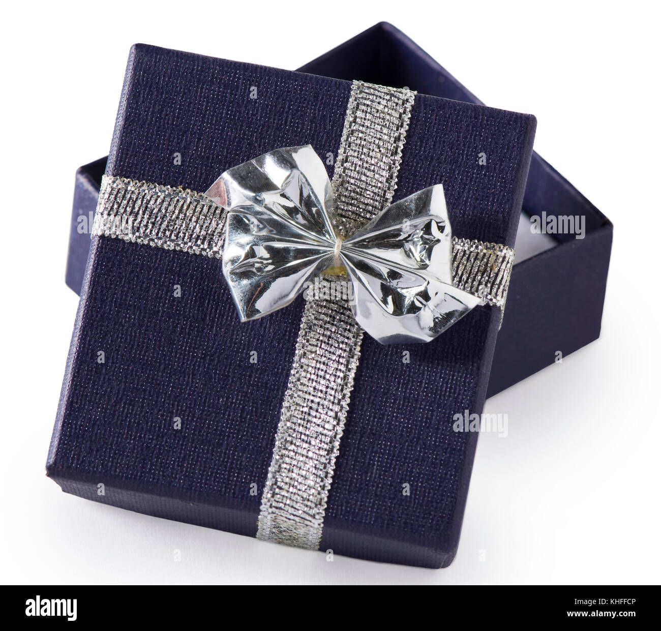 A tiny navy blue gift box with silver bow, possibly for jewelry, opened