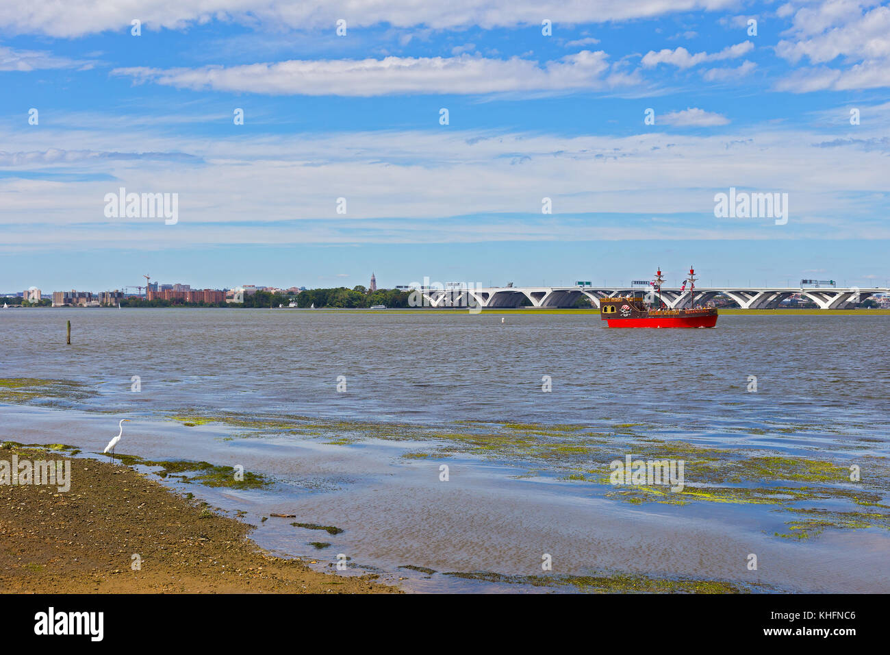 OXON HILL, MARYLAND, USA – SEPTEMBER 11: Potomac River panorama at National Harbor on September 11, 2016. Commercial vessel and two onlookers, Woodrow Stock Photo