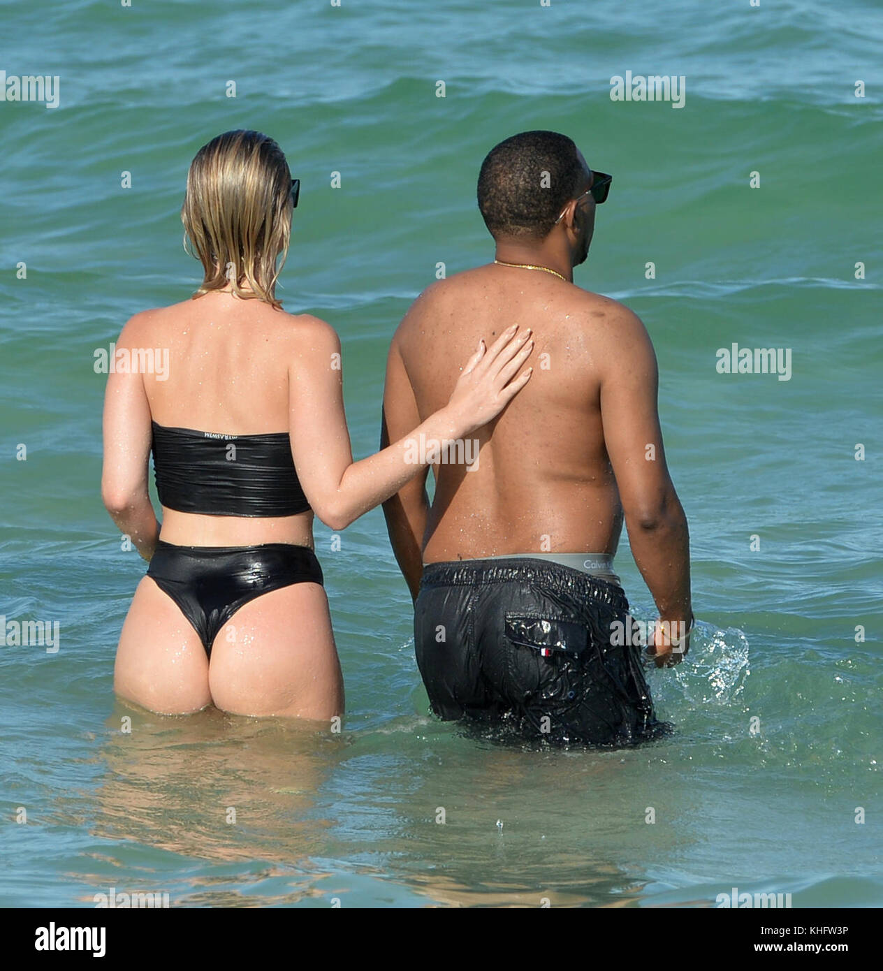 MIAMI BEACH, FL - JUNE 24: Australian fashion designer, Bianca Elouise,  looks sloppy in a black two piece bikini while taking a swim with Scott  Disick's X-Girlfriend model J Lynne in the