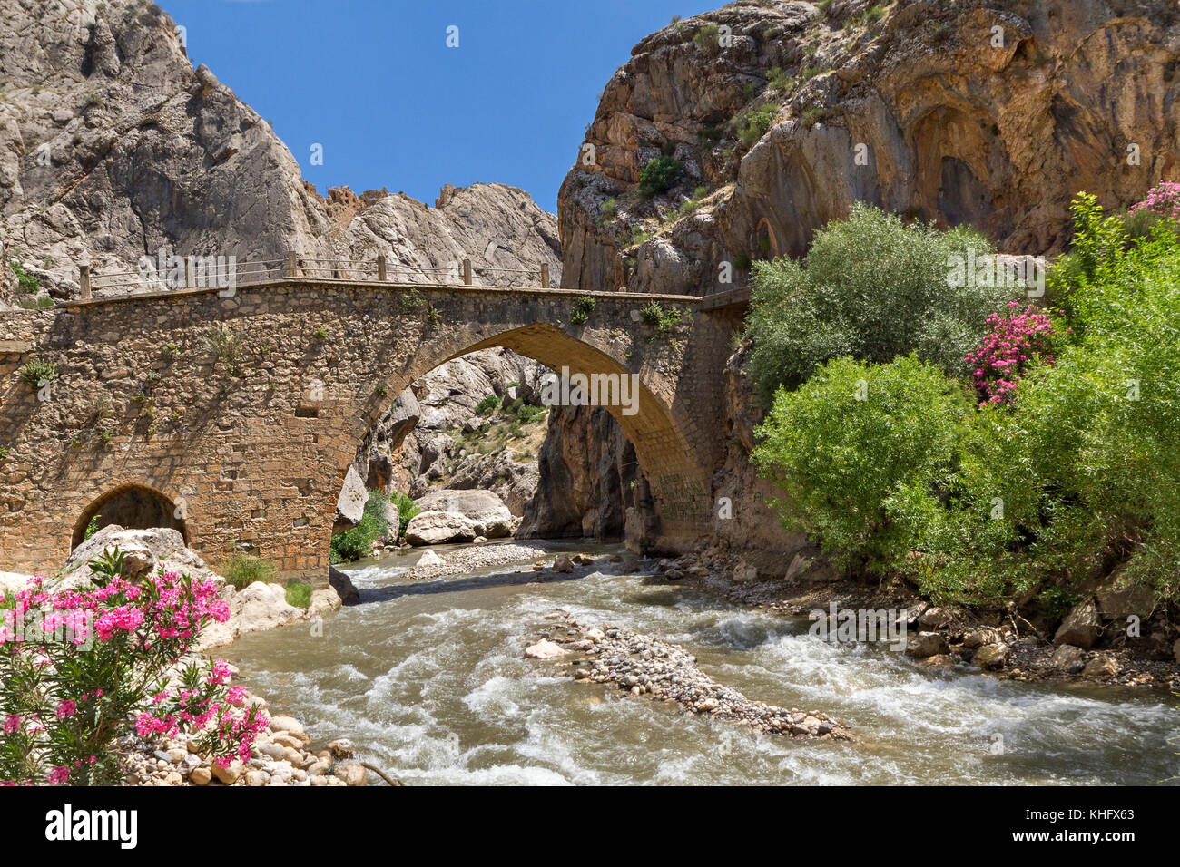 Ancient bridge known as Cendere Bridge near the Nemrut Mountain in Turkey. Stock Photo