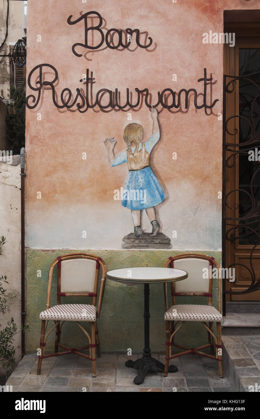 France, Corsica, Calvi, restaurant sign and waiting area Stock Photo