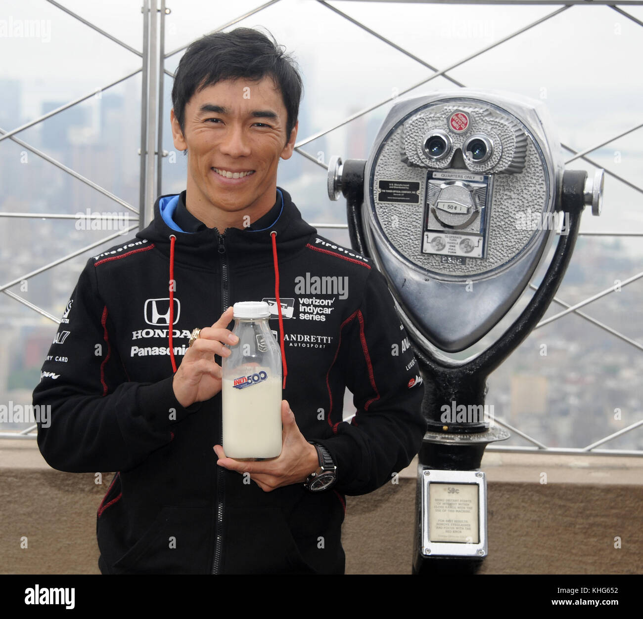 NEW YORK, NY - MAY 30: Indy driver Takuma Sato at The Empire State Building. Takuma Sato, winner of the 101st running of the Indianapolis 500 and driver of the #26 Ruoff Home Mortgage Honda, will visit the Empire State Building following his victory in Sunday’s historic race. Sato became the first Japanese driver to win “The Greatest Spectacle in Racing” when he edged three-time Indy 500 winner Helio Castroneves to the finish line by 0.2011 of a second. His victory marked the fifth overall and second consecutive Indy 500 win for Andretti Autosport on May 30, 2017 in New York City.    People:   Stock Photo
