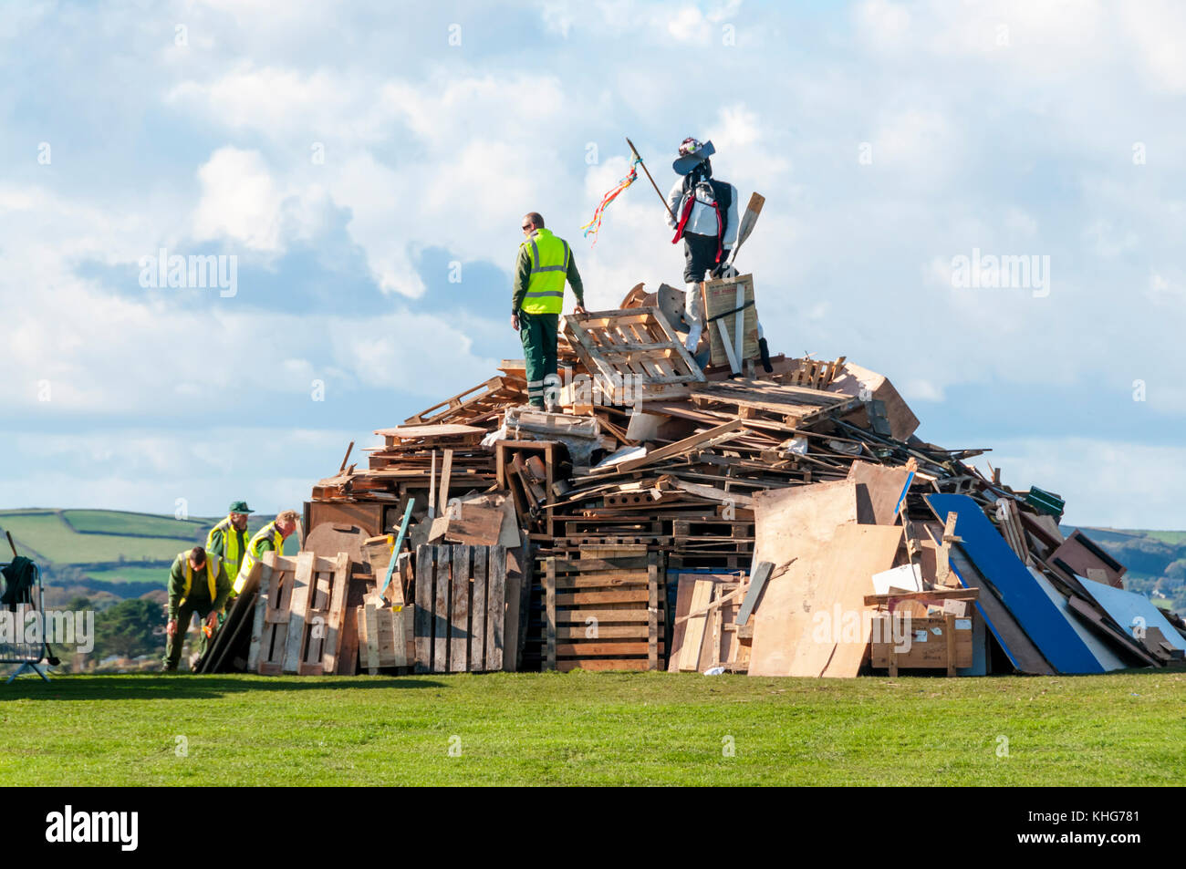 Council workers building the municipal bonfire on Plymouth Hoe ready for Guy Fawkes' night. Stock Photo