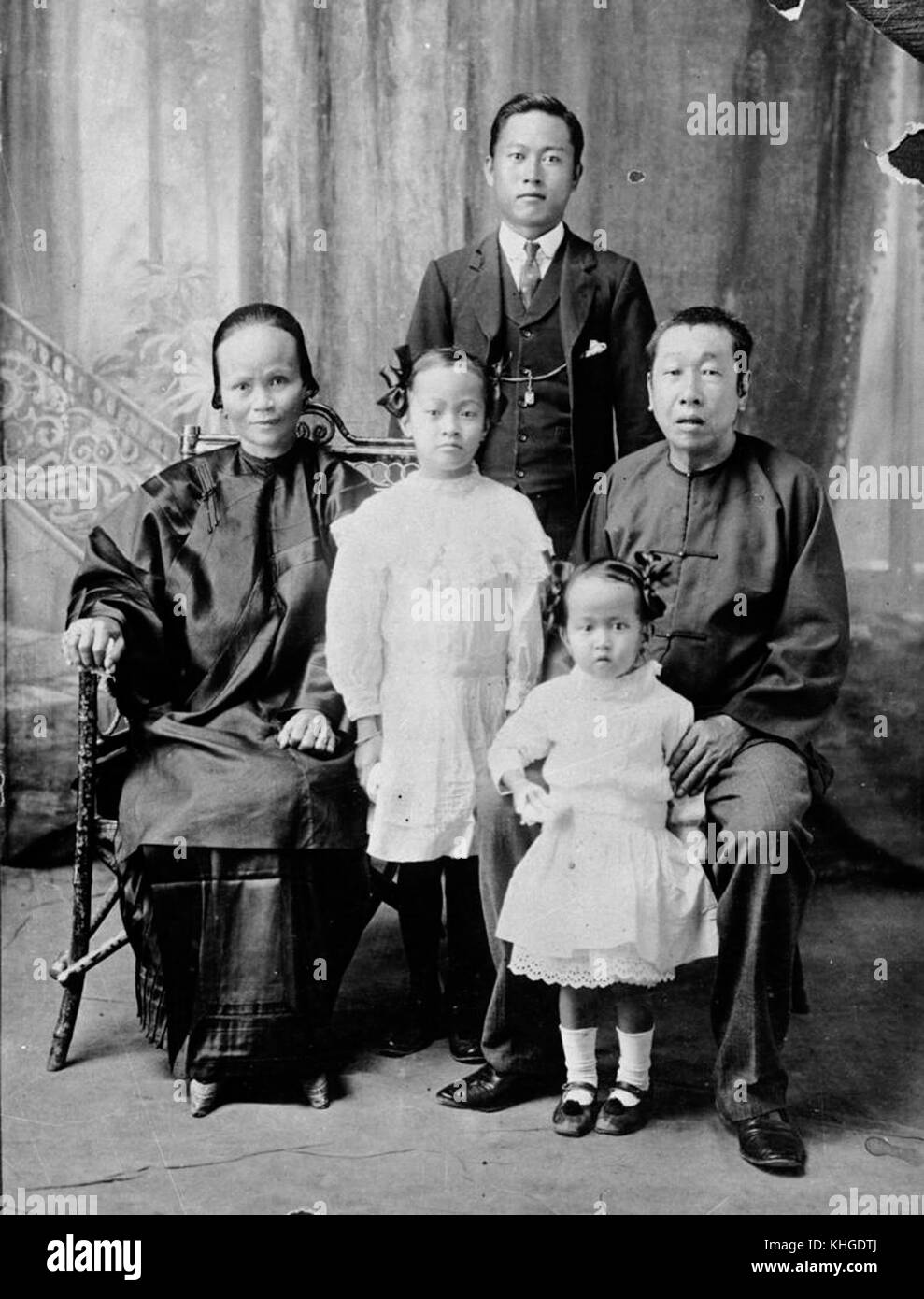 1 69339 Mee Yong Tom and her younger sister Annie, with their father ...