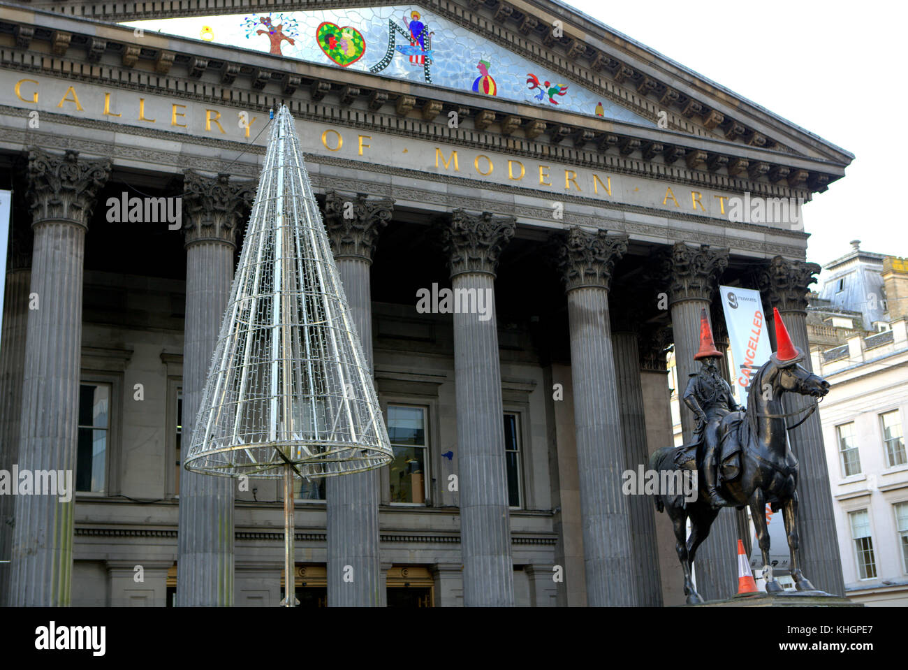Glasgow, Scotland, UK 17th Nov, 2017. First full day of Princes square christmas lights open ahead of the city's george square celebrations that light up on sunday and the cone head man outside the goma or gallery of modern art lights up on the same night. Credit: gerard ferry/Alamy Live News Stock Photo