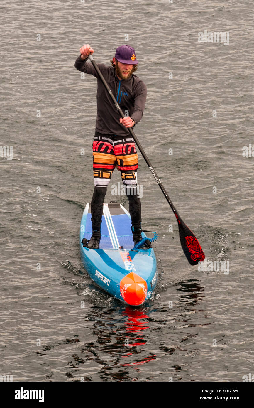Stand up paddleboarding in Southport, Merseyside. UK Weather. November, 2017. Grey skies over the resort for the UK SUP North UK, Stand up Paddle Board Winter SUP Racing in Marine Lake. Stock Photo