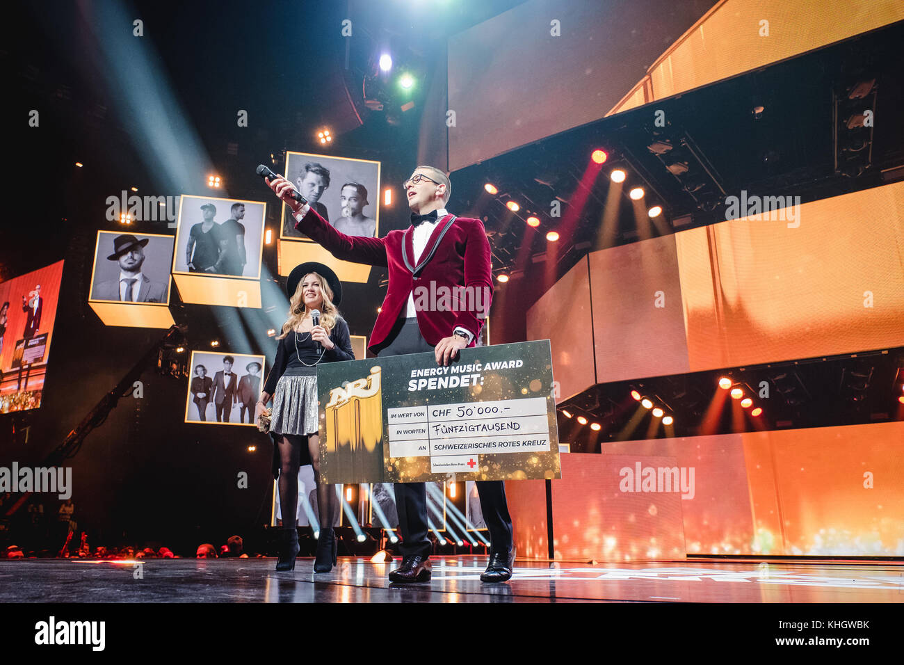 Switzerland, Zürich - November 17, 2017. Energy radio hosts Fabienne Wernly  (L) and Jontsch (R) are about the announce the Energy Music Award winner  during the Energy Star Night 2017 in Hallenstadion