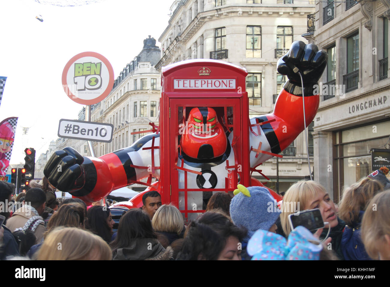 London, UK. 19th Nov 2017.  People with their children seen around a Ben 10 Hero installation during the Hamleys Christmas Toy Parade on a traffic-free Regents Street on 19 November. The mile of style was transformed into a traffic-free all-day extravaganza for the biggest Hamleys Toy Parade and ‘Character Meet and Greet'. Credit: David mbiyu/Alamy Live News Stock Photo