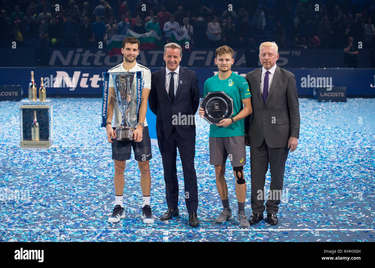 O2, London, UK. 19 November, 2017. Nitto ATP Singles Final celebrations on centre court. L to r: Grigor Dimitrov, winner; Chris Kermode, Executive Chairman and President, ATP; David Goffin, runner-up; Boris Becker, 1988, 1992 and 1995 Champion. Credit: Malcolm Park/Alamy Live News. Stock Photo