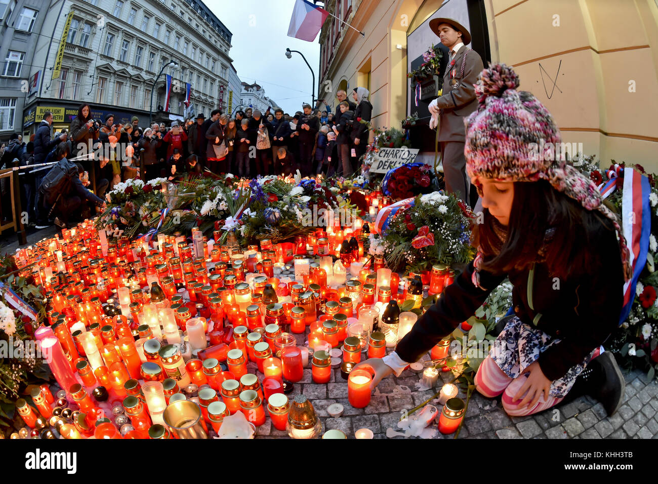Thousands of people light candles as they pay respect to the 1989 events that lead to fall of communism in front of the memorial plaque marking the November 17, 1989 events on Narodni (National) Street in Prague, Czech Republic, on Friday, November 17, 2017. The Day of Struggle for Freedom and Democracy on November 17 commemorates student demonstrations after the Nazi occupation in 1939 and against the Communist regime in 1989. Communist police cordoned off a student protest march in the Prague centre on November 17, 1989 and then brutally beat up its participants. The police violence triggere Stock Photo