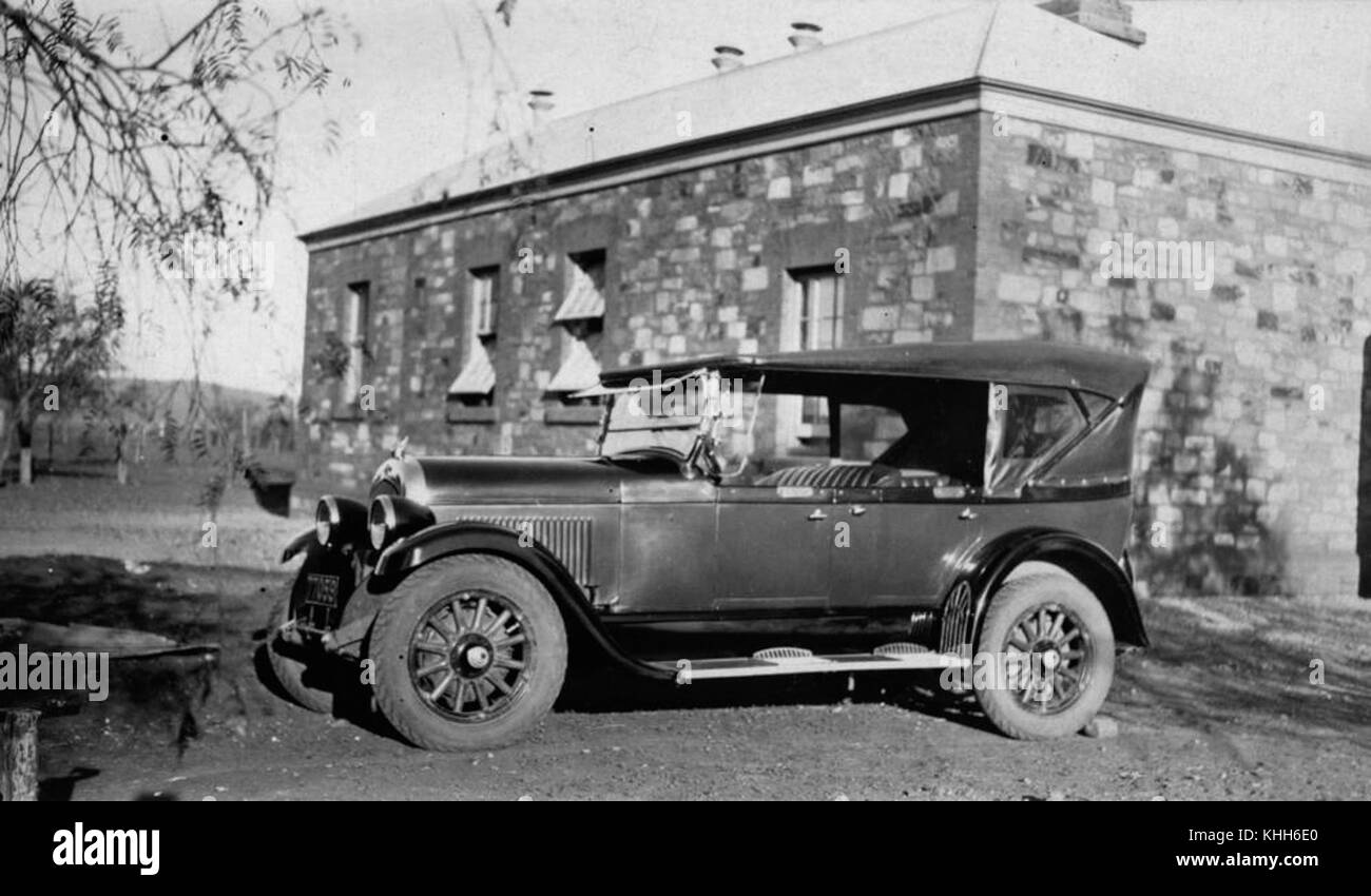2 213172 Chrysler 6, Model 70 in front of stone building, ca. 1926 Stock Photo