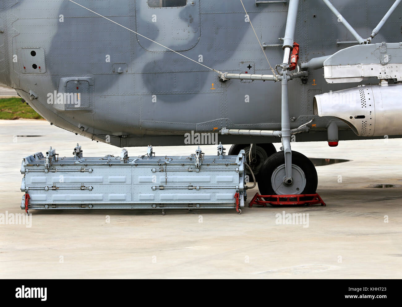 Container with technical equipment near multipurpose helicopter Mi8