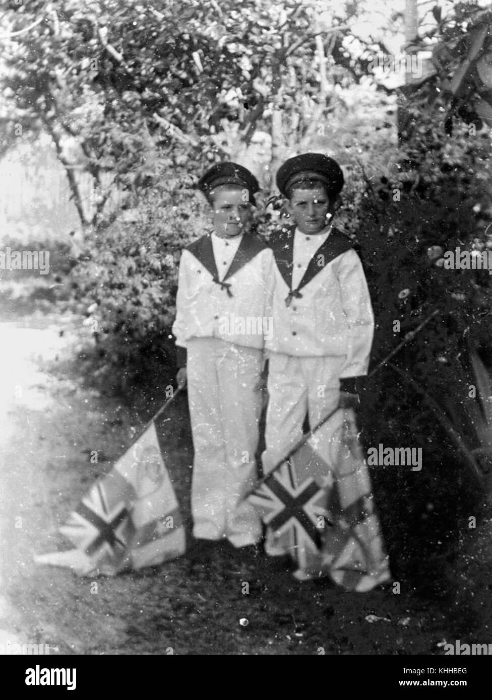 Two boys dress Black and White Stock Photos & Images - Alamy