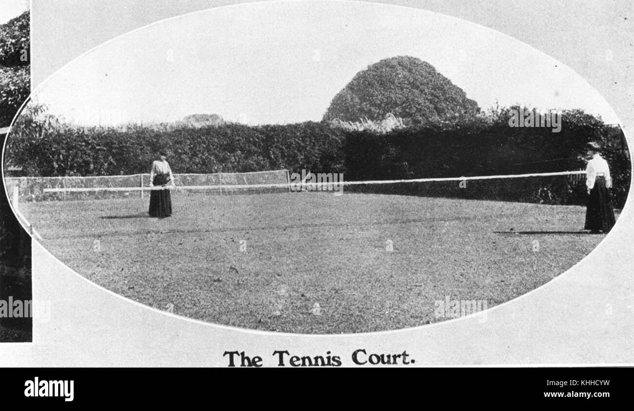 2 395617 Two women playing tennis on the Windermere tennis court, 1907