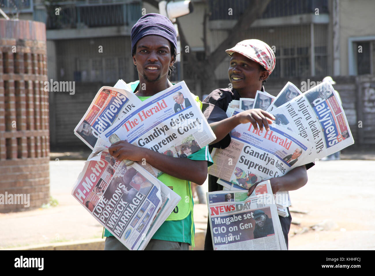 HARARE, ZIMBABWE -  12 October 2011:  Newspaper venders with the days dailies in the streets Harare. Credit: David Mbiyu/Alamy Live News Stock Photo