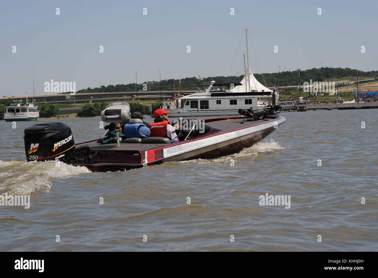 A fast boat heads to dock Stock Photo Alamy