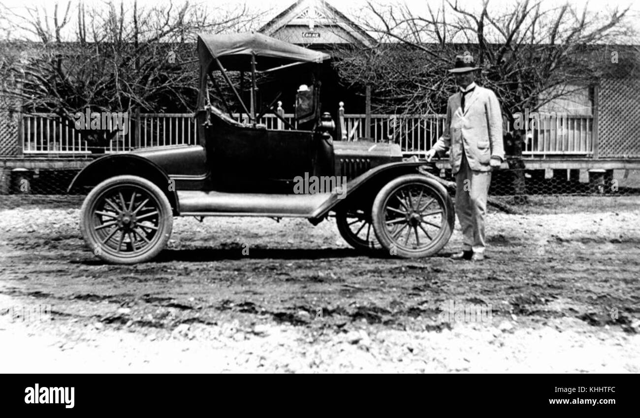 2 188343 Doctor McLennan pictured beside his motor vehicle outside his home, Cloncurry, 1919 Stock Photo