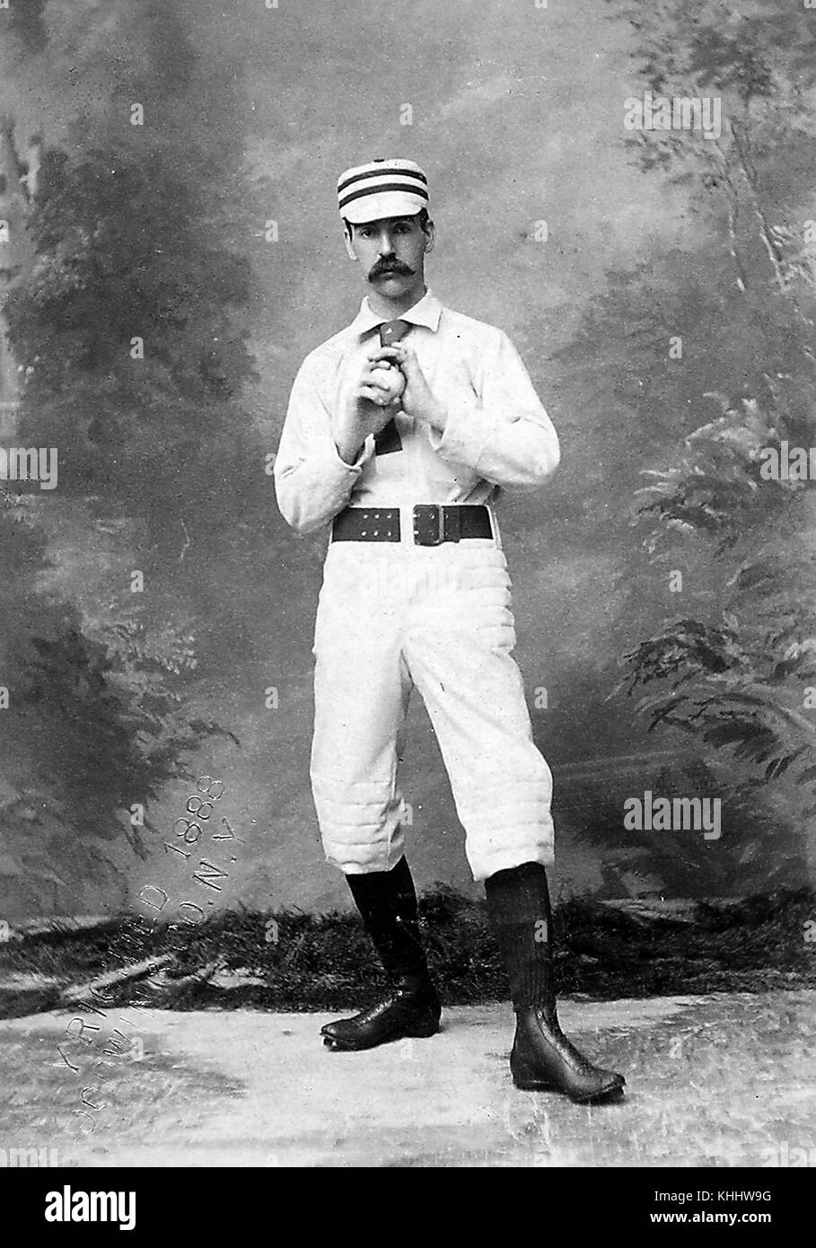 Portrait if Charlie Ferguson, American right-handed pitcher in Major League Baseball who played his entire four-year career for the Philadelphia Quakers, standing in pitching stance, photograph by GE Gray, 1900. From the New York Public Library. Stock Photo
