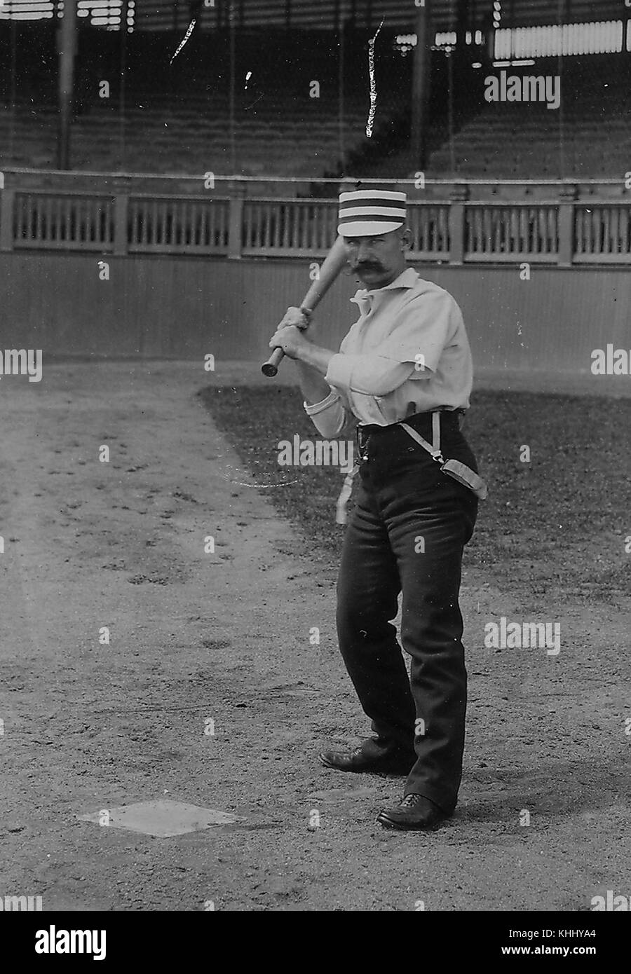 Portrait of Ed Andrews, right-handed second baseman and outfielder over parts of eight seasons (18841891), in Philadelphia Quakers uniform, in the field, holding a bat, in hitting pose, photograph by Gross and Company, 1900. From the New York Public Library. Stock Photo