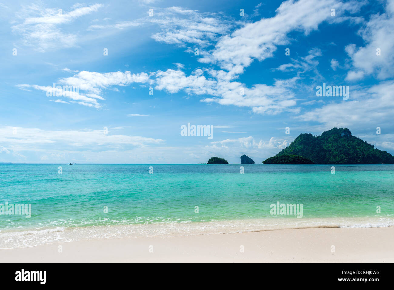 Tropic island in azure sea hi-res stock photography and images - Alamy