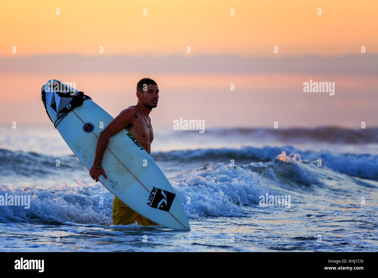 Surfer at sunset, Sanur Beach, Bali, Indonesia, Asia Stock Photo