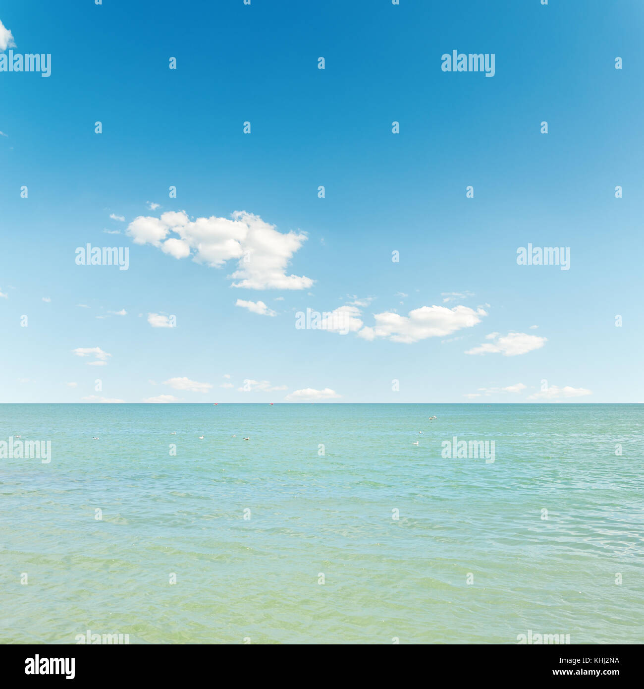blue sea and sky with clouds Stock Photo - Alamy