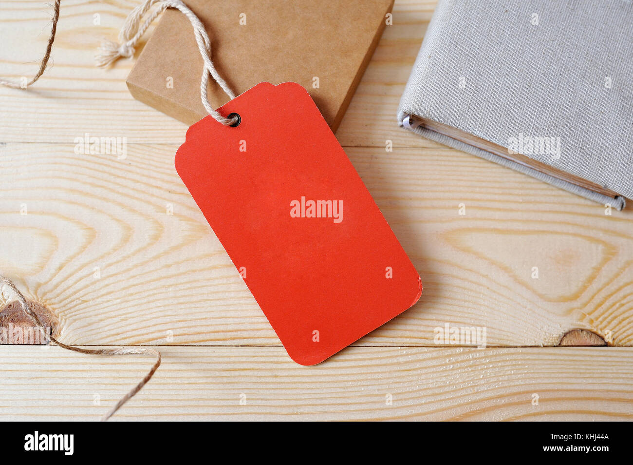 Red Tag Large Large Price red Tag red tag on a golden wooden background Stock Photo ...