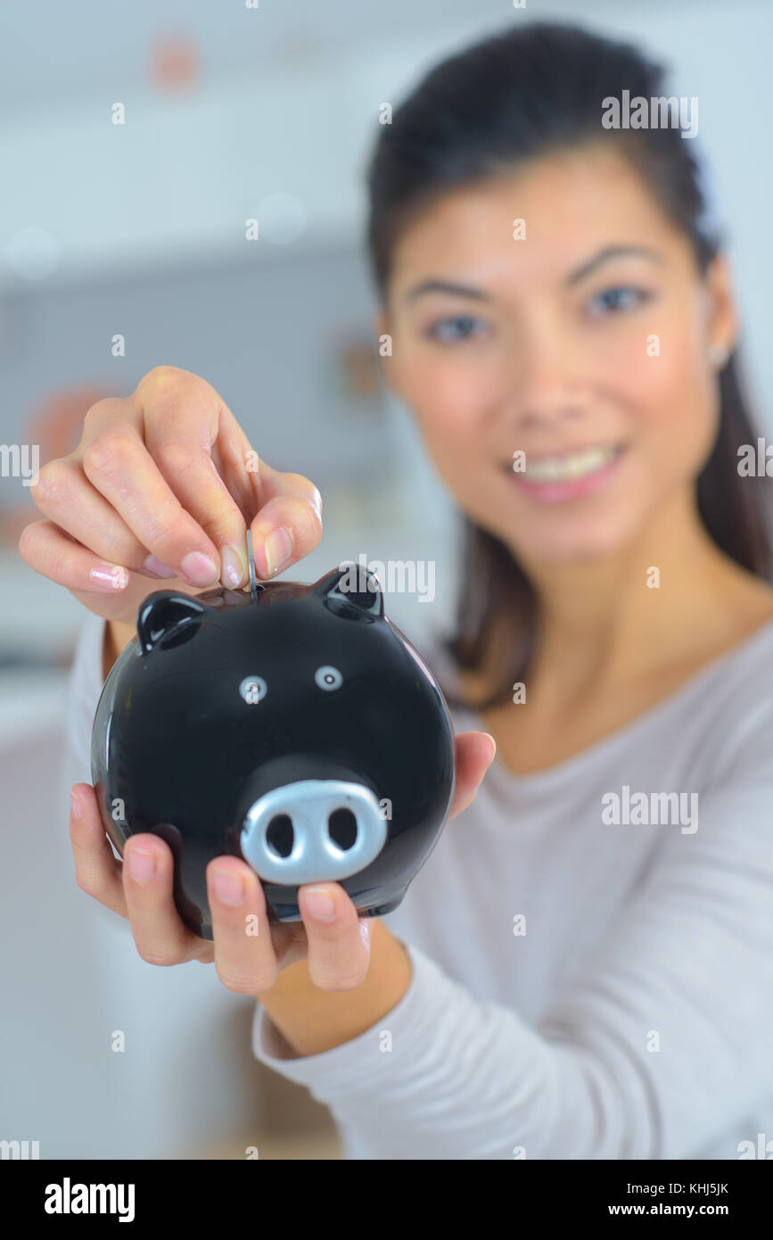 beautiful woman with piggy bank Stock Photo Alamy