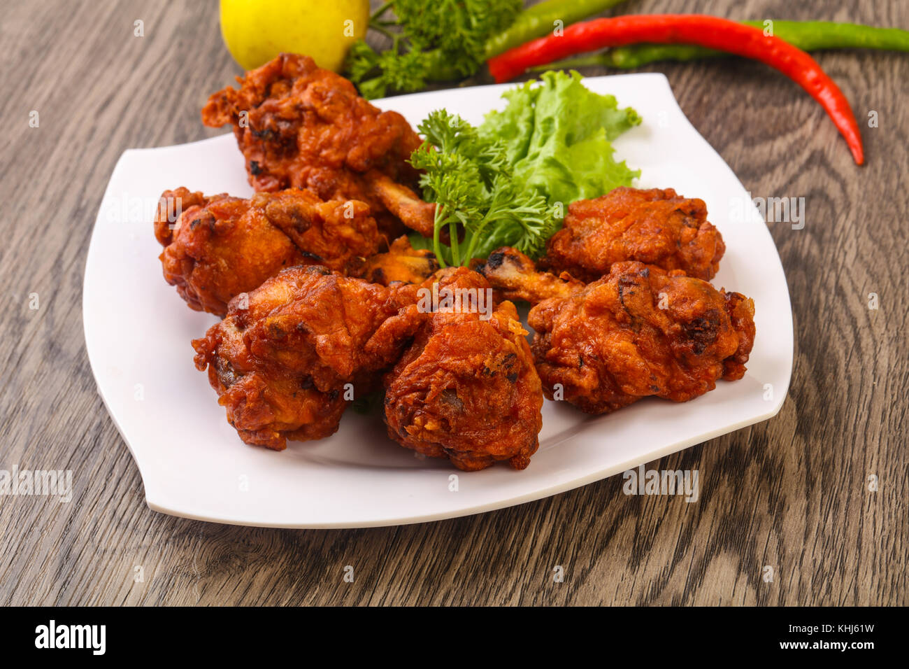 Indian traditional cuisine Chicken lollipops with spices Stock Photo