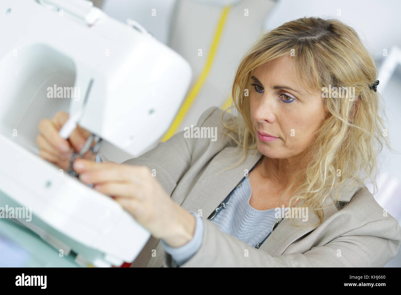 fashion designer sewing with sewing machine Stock Photo Alamy