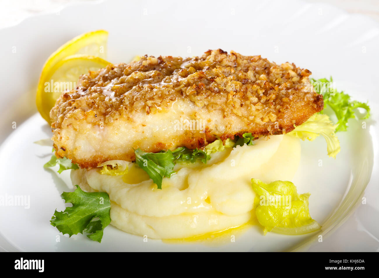 Baked Cod fish with mashed potato Stock Photo - Alamy