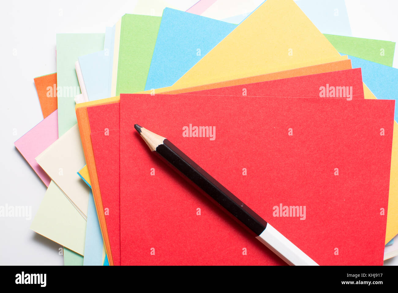 Sheets of bright colored art paper and pencil for drawing Stock Photo Alamy
