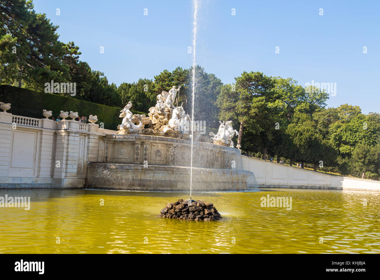 VIENNA, AUSTRIA - SEPTEMBER 11, 2016 : View of historical fountain in Schönbrunn Palace Garden in Vienna, on bright sky background. Stock Photo